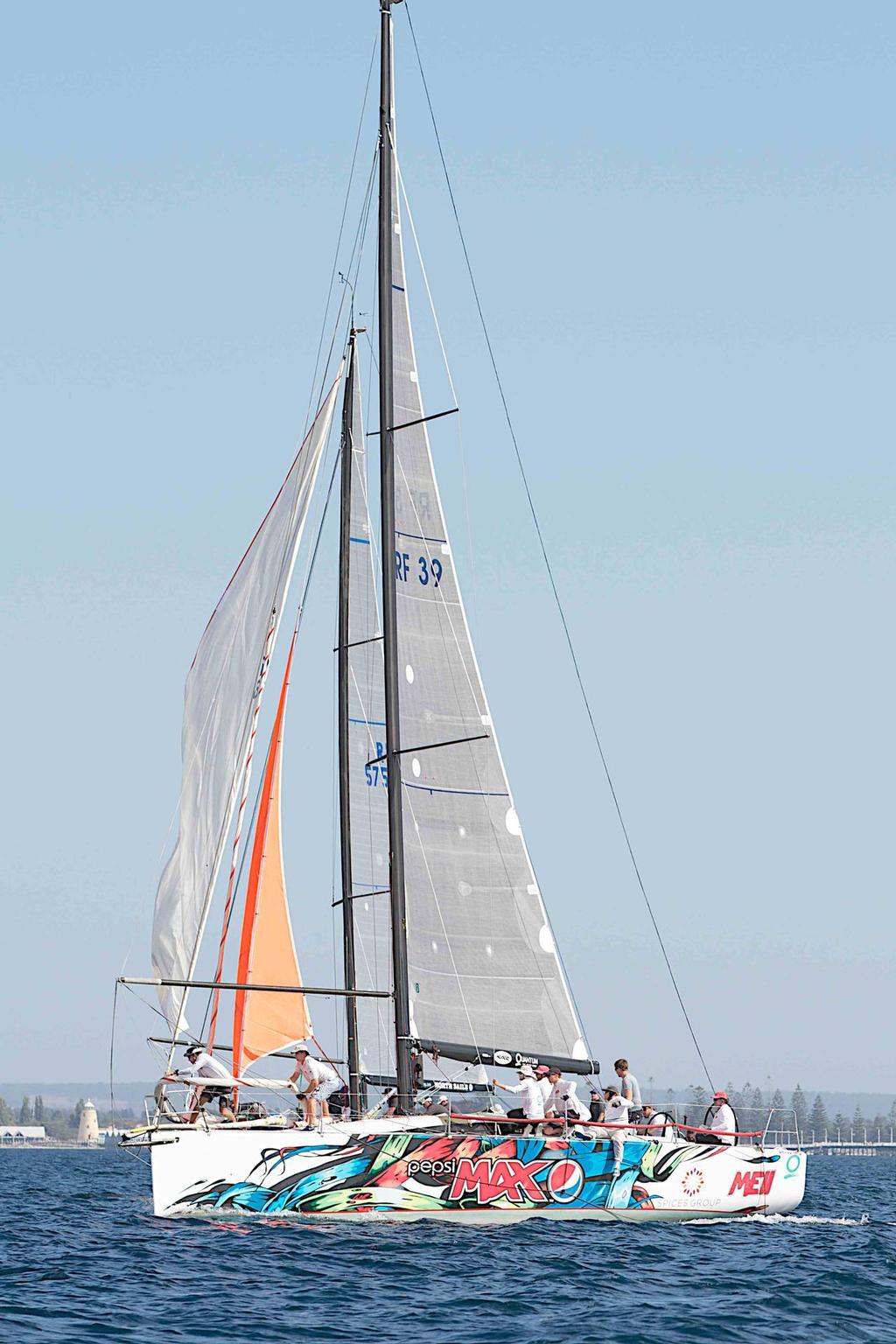 Trouble! both yachts go for a spinnaker change while The Cadillac scoots away into the distance. © Bernie Kaaks